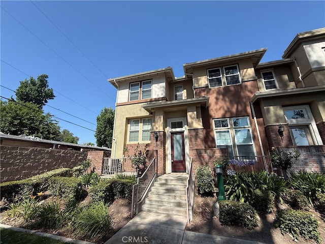 194 Principia Ct, Claremont, CA 91711 - view of front facade featuring stucco siding and brick siding