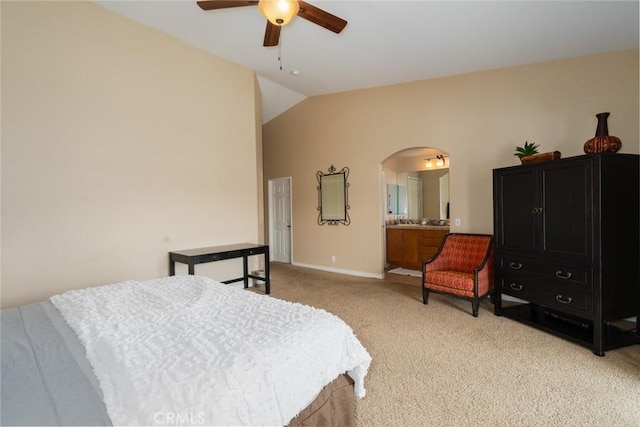 79140 Fred Waring Dr, Bermuda Dunes, CA 92203 - bedroom with light carpet, vaulted ceiling, arched walkways, and ceiling fan