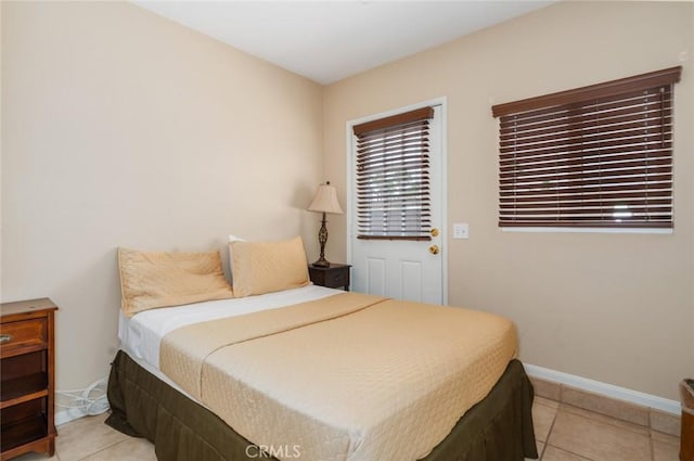 79140 Fred Waring Dr, Bermuda Dunes, CA 92203 - bedroom with light tile patterned floors and baseboards