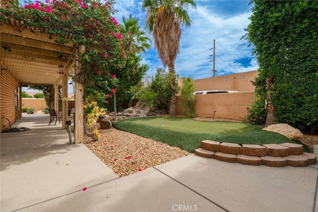 79140 Fred Waring Dr, Bermuda Dunes, CA 92203 - view of yard with a patio and an area to practice putting