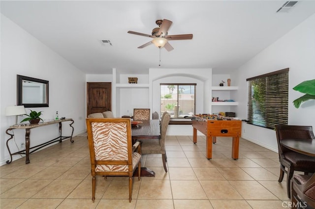 79140 Fred Waring Dr, Bermuda Dunes, CA 92203 - dining space featuring ceiling fan, light tile patterned floors, and built in features