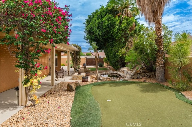 79140 Fred Waring Dr, Bermuda Dunes, CA 92203 - view of yard with a putting area and a patio
