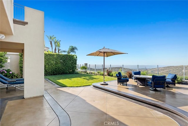 8 Pavona, Newport Coast, CA 92657 - view of patio / terrace with an outdoor fire pit