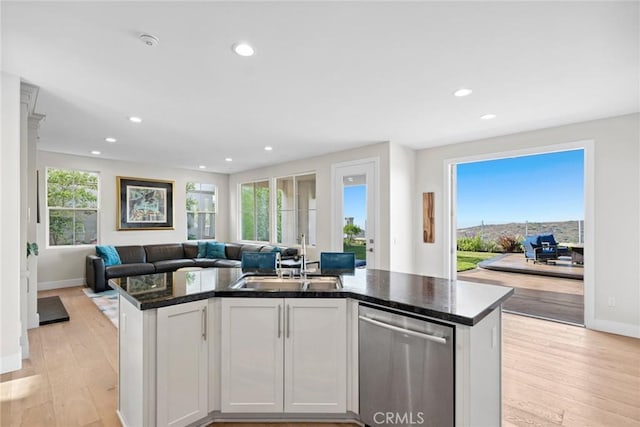 8 Pavona, Newport Coast, CA 92657 - kitchen featuring dishwasher, open floor plan, a kitchen island with sink, recessed lighting, and light wood finished floors
