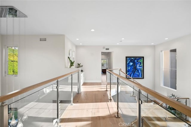 8 Pavona, Newport Coast, CA 92657 - hallway featuring an upstairs landing, wood finished floors, and recessed lighting