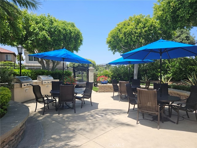 8 Pavona, Newport Coast, CA 92657 - view of patio with outdoor dining area and area for grilling