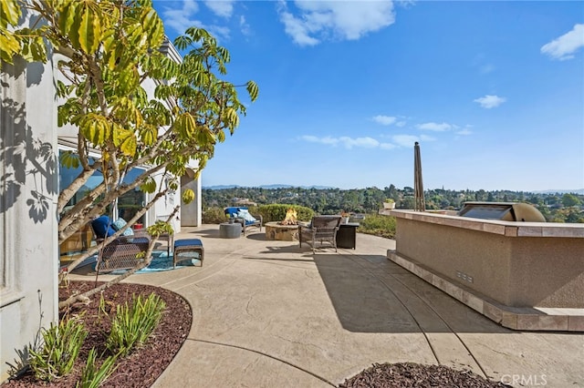 2240 Aqua Hill Rd, Fallbrook, CA 92028 - view of patio / terrace with an outdoor fire pit