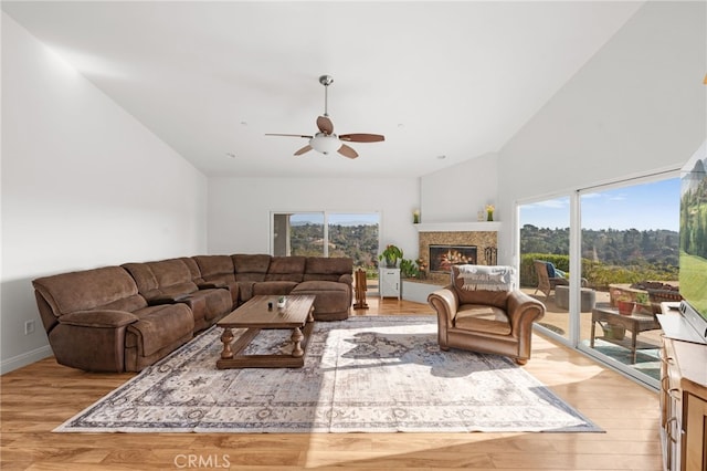 2240 Aqua Hill Rd, Fallbrook, CA 92028 - living area featuring plenty of natural light, wood finished floors, ceiling fan, and high vaulted ceiling