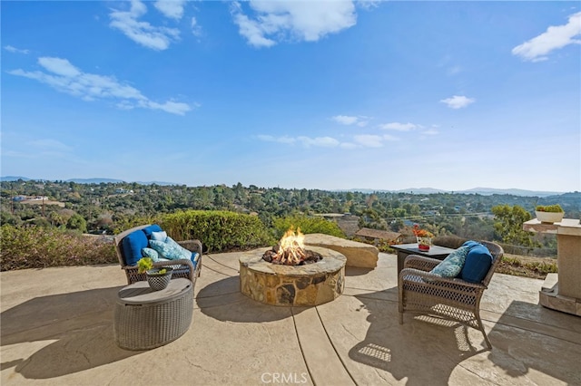 2240 Aqua Hill Rd, Fallbrook, CA 92028 - view of patio with a fire pit and a mountain view