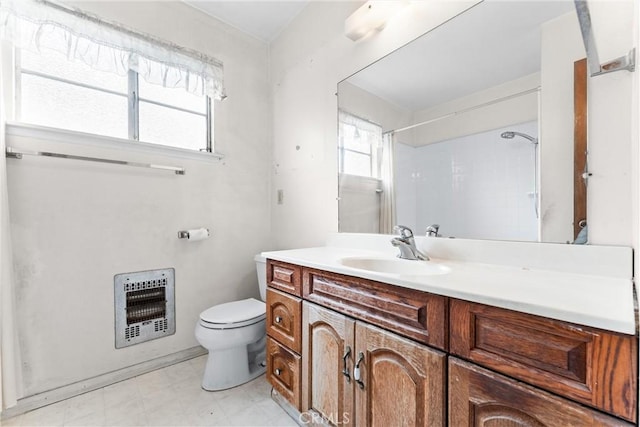 1305 S Westchester Dr, Anaheim, CA 92804 - bathroom featuring heating unit, vanity, and a shower