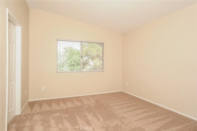 44930 11th St E, Lancaster, CA 93535 - spare room featuring light colored carpet and lofted ceiling