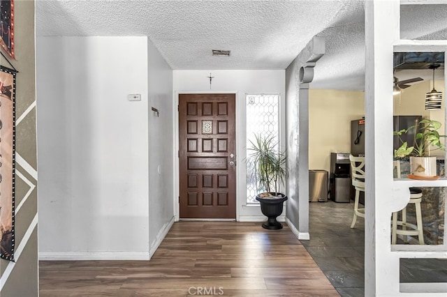 4883 E Geary St, Fresno, CA 93725 - foyer featuring wood finished floors and ceiling fan