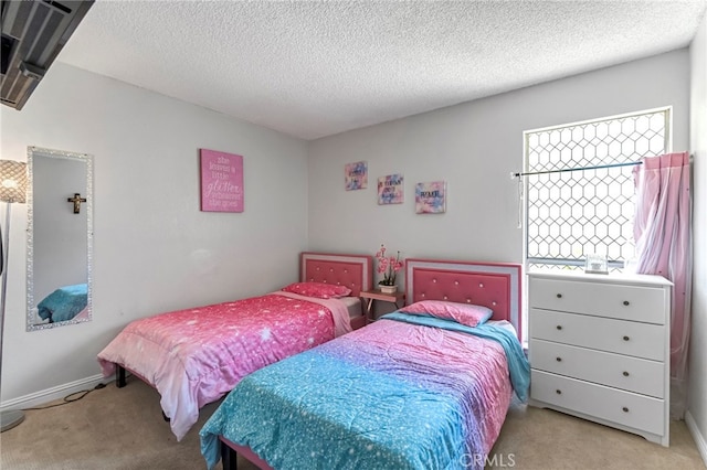 4883 E Geary St, Fresno, CA 93725 - bedroom with light carpet and a textured ceiling
