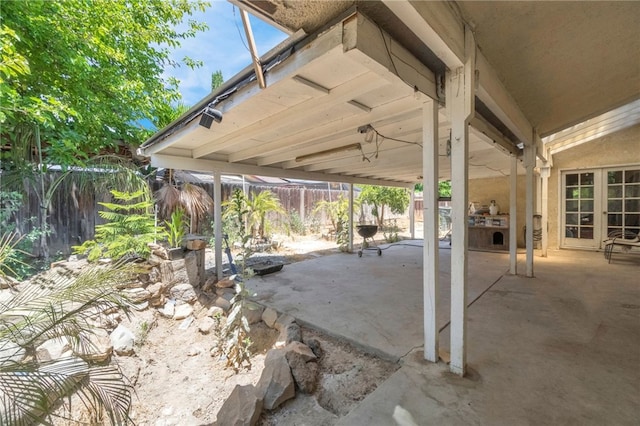 4883 E Geary St, Fresno, CA 93725 - fenced backyard featuring a patio area and french doors
