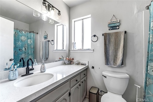 4883 E Geary St, Fresno, CA 93725 - bathroom featuring vanity and a shower with curtain