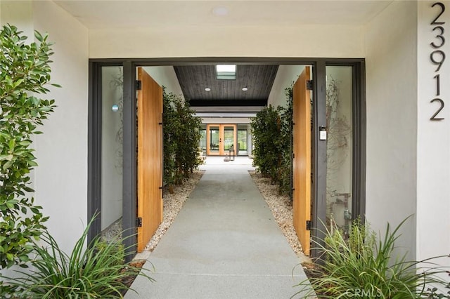 23912 Hillhurst Dr, Laguna Niguel, CA 92677 - view of exterior entry with french doors and stucco siding