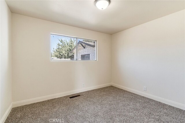 2738 S Fairway Ct, Visalia, CA 93277 - spare room featuring carpet floors and baseboards