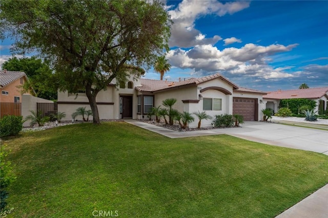 47645 Calle Diamante, Indio, CA 92201 - ranch-style home featuring concrete driveway, stucco siding, an attached garage, and a tile roof