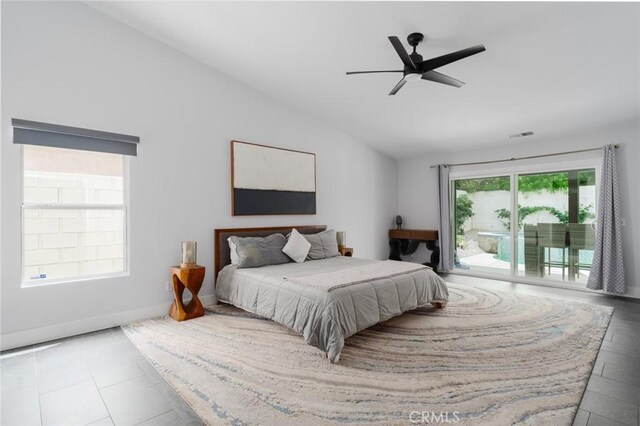 47645 Calle Diamante, Indio, CA 92201 - bedroom with lofted ceiling, access to outside, and ceiling fan