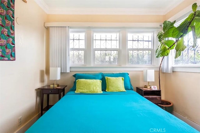 5162 S Manhattan Pl, Los Angeles, CA 90062 - bedroom featuring ornamental molding