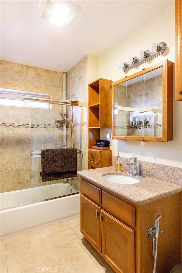 5162 S Manhattan Pl, Los Angeles, CA 90062 - full bathroom with vanity, enclosed tub / shower combo, and tile patterned flooring