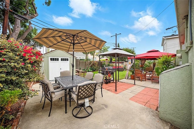 4303 E De Ora Way, Long Beach, CA 90815 - fenced backyard featuring a gazebo, outdoor dining area, a shed, a patio, and grilling area