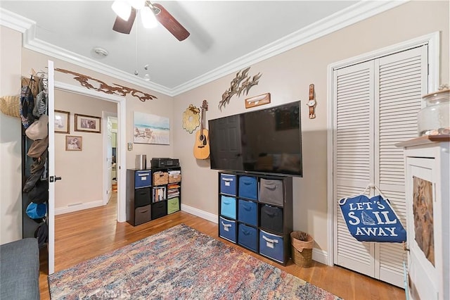 4303 E De Ora Way, Long Beach, CA 90815 - living room featuring a ceiling fan, wood finished floors, and crown molding