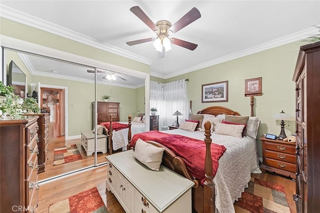 4303 E De Ora Way, Long Beach, CA 90815 - bedroom featuring light wood-style floors, a ceiling fan, a closet, and ornamental molding