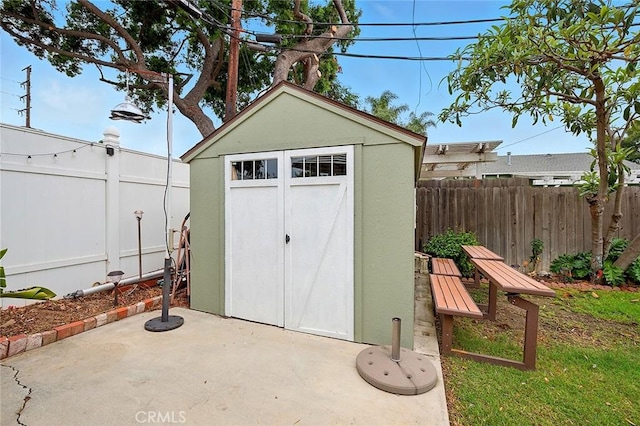 4303 E De Ora Way, Long Beach, CA 90815 - view of shed featuring a fenced backyard