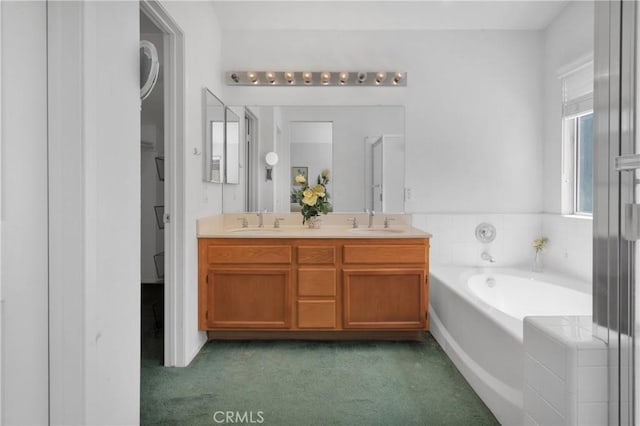 15030 Camino Arroyo, Chino Hills, CA 91709 - bathroom with double vanity, a garden tub, and carpet flooring