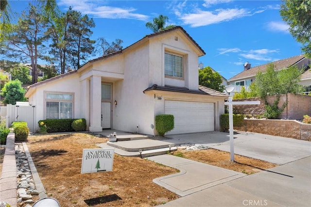 15030 Camino Arroyo, Chino Hills, CA 91709 - view of front of property featuring stucco siding, an attached garage, and driveway