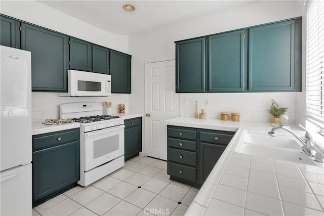 15030 Camino Arroyo, Chino Hills, CA 91709 - kitchen featuring white appliances, tile counters, and light tile patterned floors