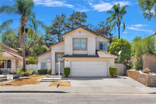 15030 Camino Arroyo, Chino Hills, CA 91709 - traditional home with stucco siding, a garage, and concrete driveway