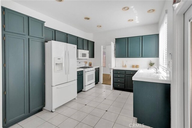 15030 Camino Arroyo, Chino Hills, CA 91709 - kitchen featuring white appliances and light tile patterned floors
