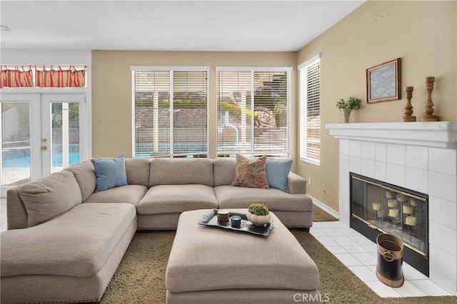 15030 Camino Arroyo, Chino Hills, CA 91709 - living area featuring french doors, plenty of natural light, and a tile fireplace
