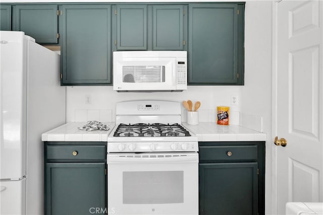 15030 Camino Arroyo, Chino Hills, CA 91709 - kitchen with white appliances and tile counters