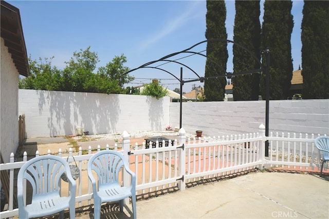 8937 Palmetto Ave, Fontana, CA 92335 - fenced backyard featuring a patio area