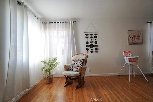 8937 Palmetto Ave, Fontana, CA 92335 - living area featuring wood finished floors