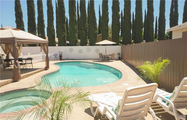 8937 Palmetto Ave, Fontana, CA 92335 - view of swimming pool with a gazebo, a fenced backyard, a patio, and outdoor dining space