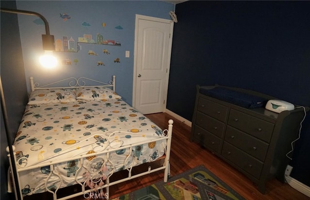 8937 Palmetto Ave, Fontana, CA 92335 - bedroom featuring wood finished floors and baseboards