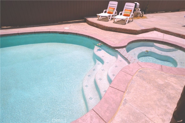 8937 Palmetto Ave, Fontana, CA 92335 - view of swimming pool with a patio and an in-ground hot tub