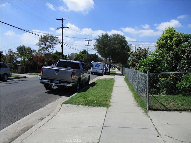 137 W Saxon Ave, San Gabriel, CA 91776 - view of asphalt road with sidewalks and curbs