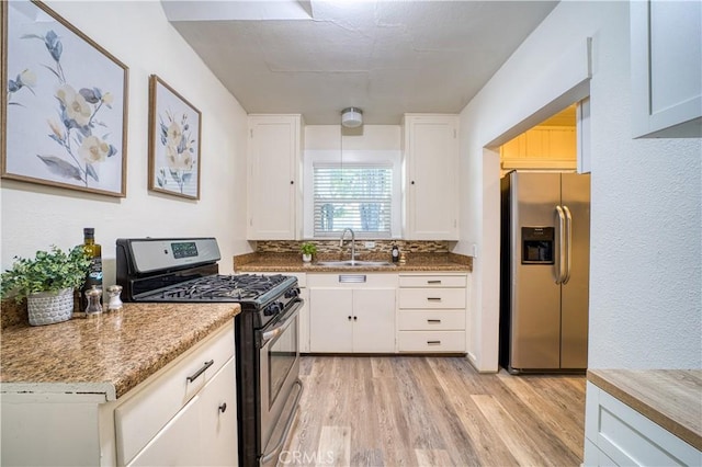 755 Chorro St, San Luis Obispo, CA 93401 - kitchen with appliances with stainless steel finishes, light wood-style flooring, and white cabinetry