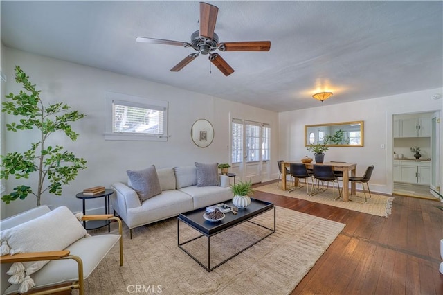 755 Chorro St, San Luis Obispo, CA 93401 - living area featuring dark wood-type flooring, plenty of natural light, and a ceiling fan
