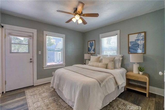 755 Chorro St, San Luis Obispo, CA 93401 - bedroom with multiple windows, dark wood finished floors, and a ceiling fan