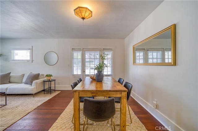 755 Chorro St, San Luis Obispo, CA 93401 - dining space featuring plenty of natural light and dark wood-style flooring