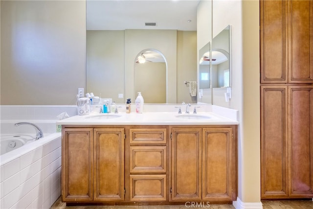 66 Glenalmond Ln, Ladera Ranch, CA 92694 - full bathroom featuring double vanity and tiled bath