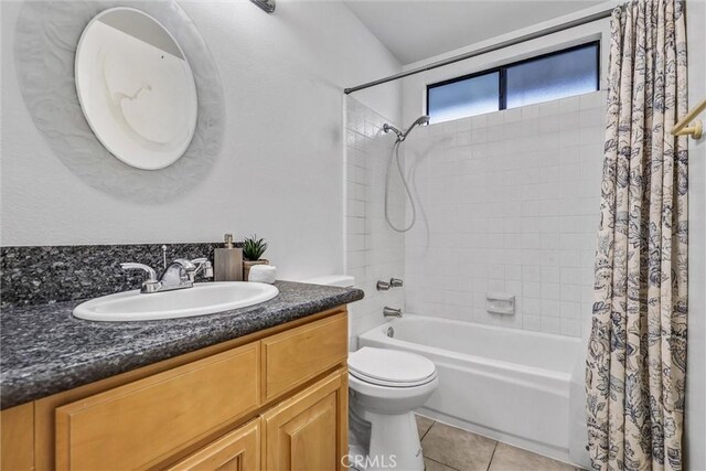 17 Gladstone, Irvine, CA 92606 - full bath with shower / bathtub combination with curtain, vanity, and tile patterned flooring