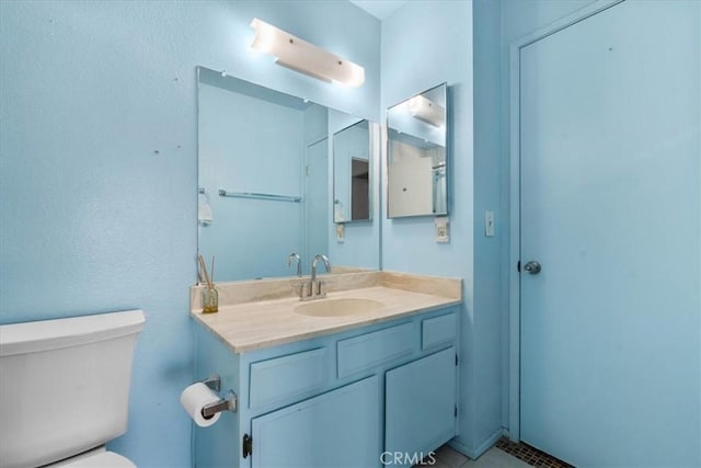 9100 Acacia Ave Unit 6, Fontana, CA 92335 - bathroom with toilet and vanity