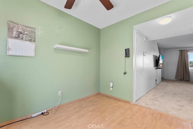 9100 Acacia Ave Unit 6, Fontana, CA 92335 - empty room featuring a ceiling fan, wood finished floors, and a textured ceiling